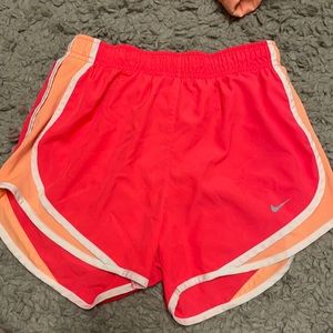 Bright pink Nike shorts